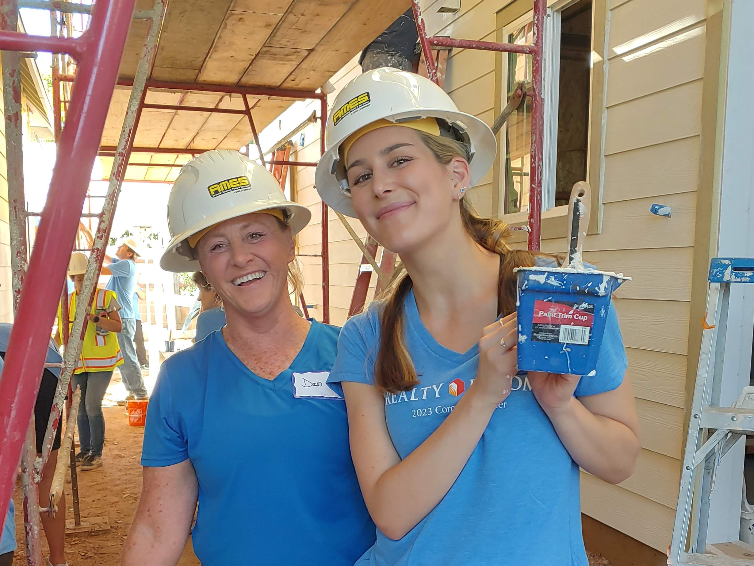 Employees volunteering through Habitat for Humanity.