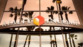 Realty income sign on building